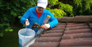 cleaning the gutter